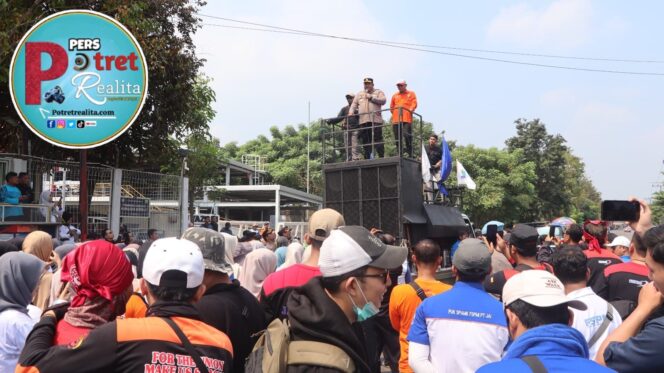 
 Polisi Lakukan Pengawalan, Peringatan Hari Buruh di Pasuruan Berlangsung Kondusif