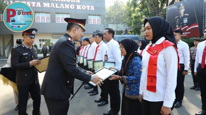 
 Harlah Pancasila Kapolresta Malang Kota Beri Penghargaan Anggota Berprestasi dan Warga Masyarakat yang Bantu Ungkap TPPO