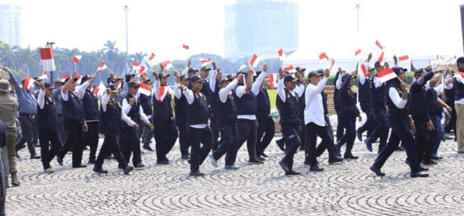 
 Satpam dan Potmas Ikut Ambil Bagian dalam Devile Hari Bhayangkara ke-79 di Monas